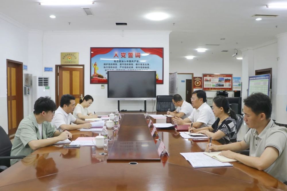 梁谋与海南省发改委副主任杨善华座谈交流 